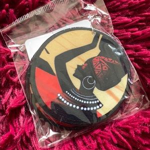 African-themed circular wooden earrings